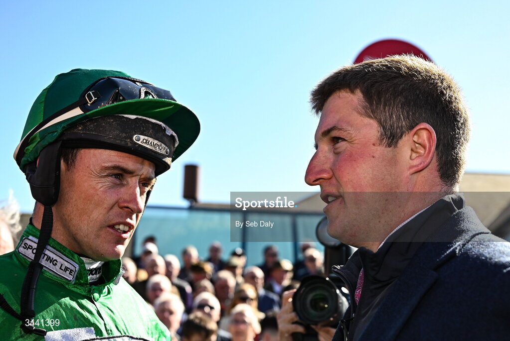 29 April 2026; Jockey JJ Slevin and trainer Harry Derham after winning the Channor Real Estate Group Novice Hurdle with Le Frimeur during day two of the Punchestown Festival at Punchestown Racecourse in Kildare. Photo by Seb Daly/Sportsfile
