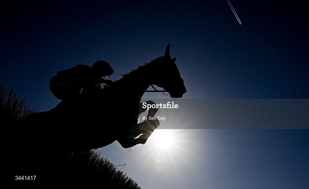 29 April 2026; Nouvotic, with Darragh O'Keeffe up, leads the field over the third fence, on their way to winning the Colm Quinn BMW Handicap Steeplechase during day two of the Punchestown Festival at Punchestown Racecourse in Kildare. Photo by Seb Daly/Sportsfile