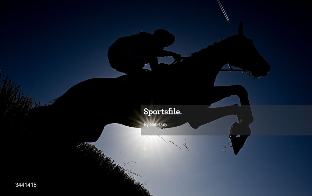 29 April 2026; Nouvotic, with Darragh O'Keeffe up, leads the field over the third fence, on their way to winning the Colm Quinn BMW Handicap Steeplechase during day two of the Punchestown Festival at Punchestown Racecourse in Kildare. Photo by Seb Daly/Sportsfile