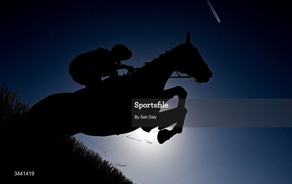 29 April 2026; Nouvotic, with Darragh O'Keeffe up, leads the field over the third fence, on their way to winning the Colm Quinn BMW Handicap Steeplechase during day two of the Punchestown Festival at Punchestown Racecourse in Kildare. Photo by Seb Daly/Sportsfile
