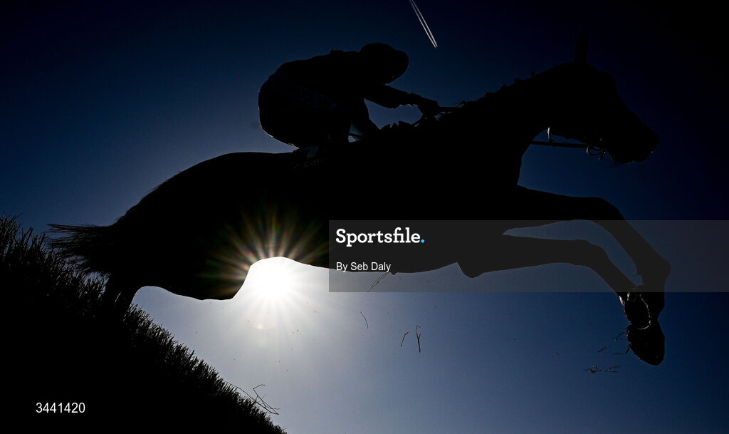 29 April 2026; Nouvotic, with Darragh O'Keeffe up, leads the field over the third fence, on their way to winning the Colm Quinn BMW Handicap Steeplechase during day two of the Punchestown Festival at Punchestown Racecourse in Kildare. Photo by Seb Daly/Sportsfile