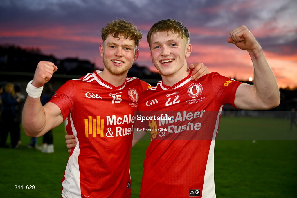 29 April 2026; Tyrone players Darragh Donnelly, left, and Darragh Devlin celebrate after their side's victory in the Dalata Hotel Group Ulster U20 Football Championship final match between Monaghan and Tyrone at BOX-IT Athletic Grounds in Armagh. Photo by Shauna Clinton/Sportsfile