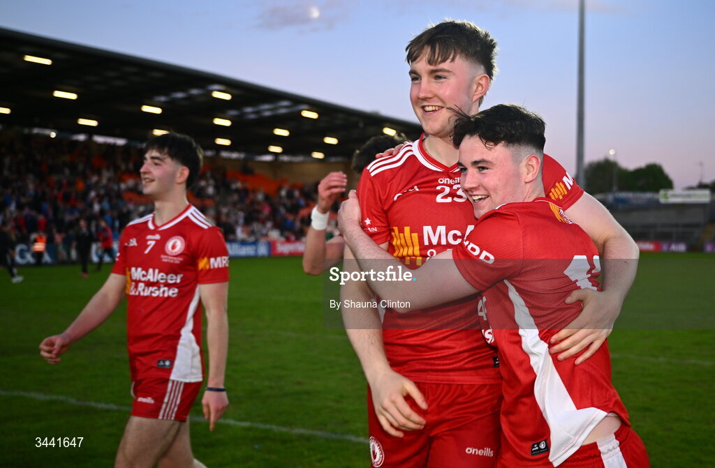 29 April 2026; Tyrone players Pádraig Goodman, left, and Adrian McGurren celebrate after their side's victory in the Dalata Hotel Group Ulster U20 Football Championship final match between Monaghan and Tyrone at BOX-IT Athletic Grounds in Armagh. Photo by Shauna Clinton/Sportsfile