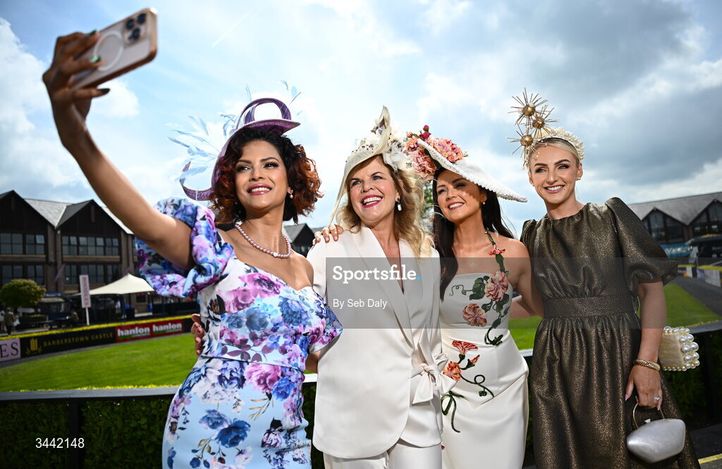1 May 2026; Racegoers, from left, Maksuda Akhter, from Malahide, Dublin, Marietta Doran, Jennifer Wrynne, from Mohill, Leitrim, and Lisa Walsh, from Meath, ahead of racing on day four of the Punchestown Festival at Punchestown Racecourse in Kildare. Photo by Seb Daly/Sportsfile