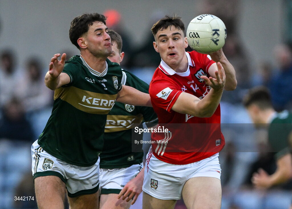 30 April 2026; Rickey Barrett of Cork is tackled by Evan Boyle of Kerry during the Dalata Hotel Group Munster U20 Football Championship final match between Kerry and Cork at Austin Stack Park in Tralee, Kerry. Photo by Brendan Moran/Sportsfile
