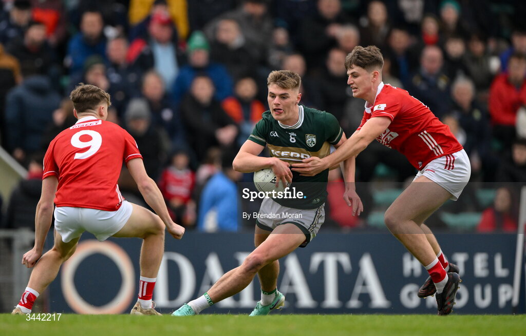 30 April 2026; Daniel Kirby of Kerry is tackled by Darragh Clifford of Cork during the Dalata Hotel Group Munster U20 Football Championship final match between Kerry and Cork at Austin Stack Park in Tralee, Kerry. Photo by Brendan Moran/Sportsfile