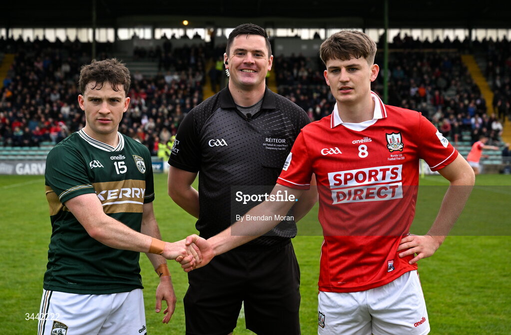 30 April 2026; Team captains Kerry captain Paddy Lane and /Darragh Clifford of Cork shake hands in the company of referee Chris Maguire before the Dalata Hotel Group Munster U20 Football Championship final match between Kerry and Cork at Austin Stack Park in Tralee, Kerry. Photo by Brendan Moran/Sportsfile