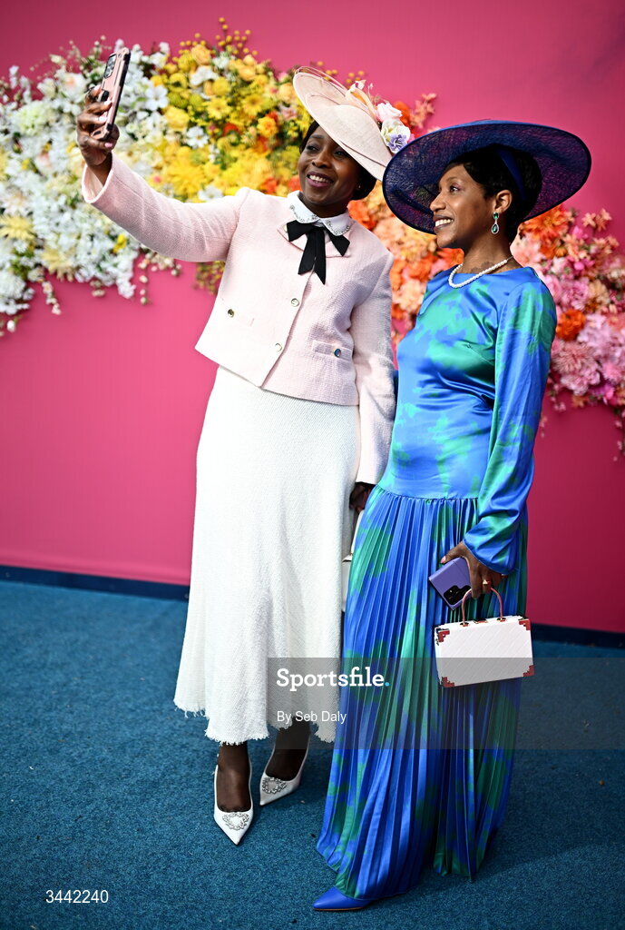 1 May 2026; Racegoers Emmy Buyoya, from Lucan, Dublin, left, and Glendah Mahlalela, from Naas, Kildare, ahead of racing on day four of the Punchestown Festival at Punchestown Racecourse in Kildare. Photo by Seb Daly/Sportsfile