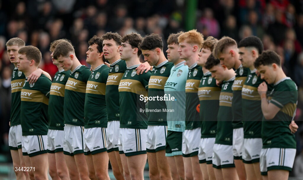 30 April 2026; Tomás Kennedy of Kerry, sixth from left, and teammates stand for the national anthem before the Dalata Hotel Group Munster U20 Football Championship final match between Kerry and Cork at Austin Stack Park in Tralee, Kerry. Photo by Brendan Moran/Sportsfile