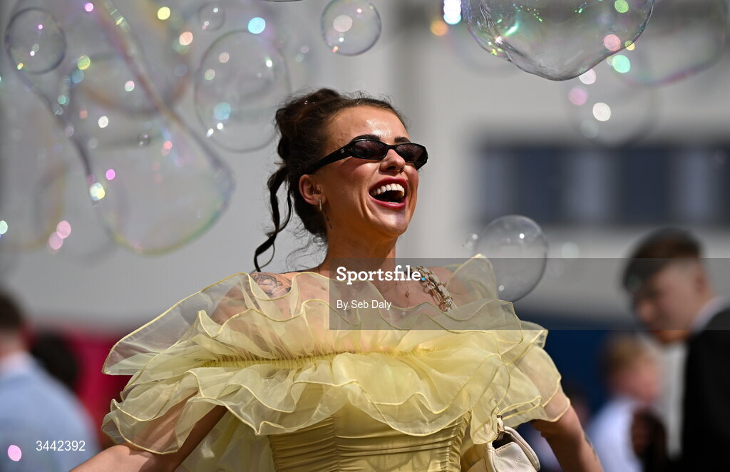 1 May 2026; Racegoer Hannah Bolger, from Enniscorthy, Wexford, enjoys the bubbles ahead of racing on day four of the Punchestown Festival at Punchestown Racecourse in Kildare. Photo by Seb Daly/Sportsfile