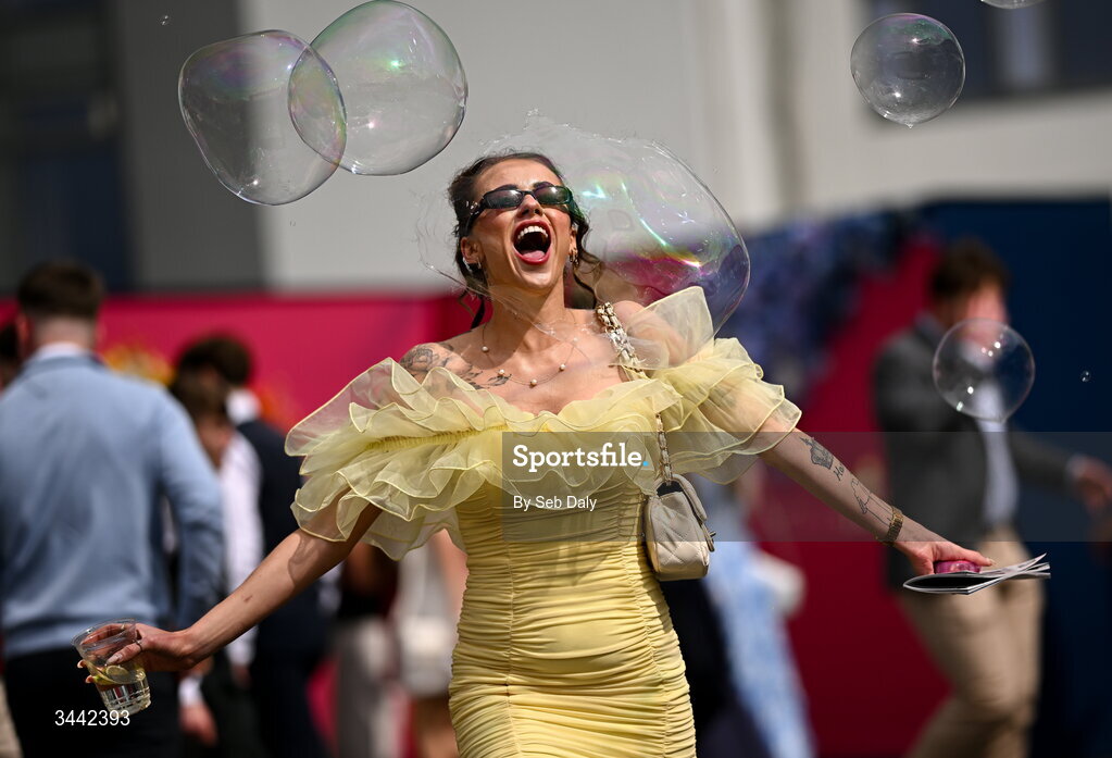 1 May 2026; Racegoer Hannah Bolger, from Enniscorthy, Wexford, enjoys the bubbles ahead of racing on day four of the Punchestown Festival at Punchestown Racecourse in Kildare. Photo by Seb Daly/Sportsfile