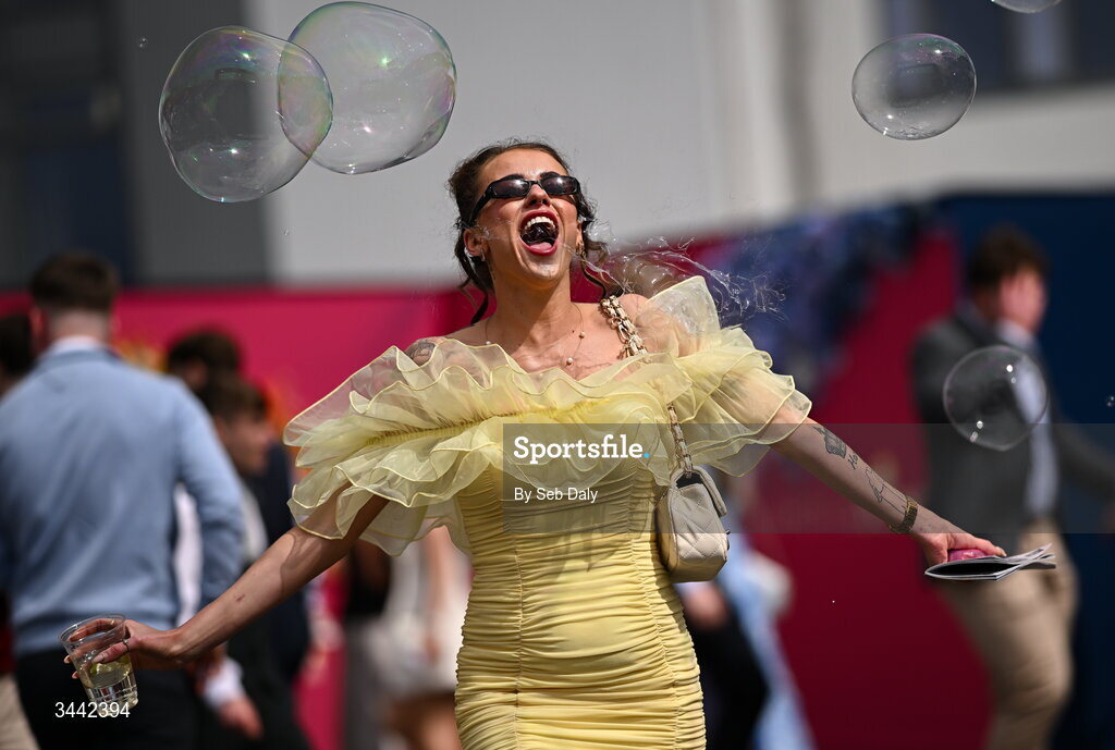 1 May 2026; Racegoer Hannah Bolger, from Enniscorthy, Wexford, enjoys the bubbles ahead of racing on day four of the Punchestown Festival at Punchestown Racecourse in Kildare. Photo by Seb Daly/Sportsfile