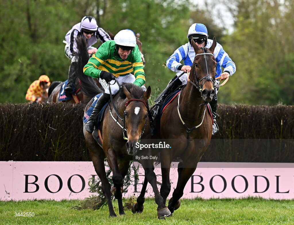 1 May 2026; Wonderwall, with Rob James up, right, races alongside eventual second Its On The Line, with Derek O'Connor up, as the clear the last, on their way to winning the Uniquely Champion Hunters Chase on day four of the Punchestown Festival at Punchestown Racecourse in Kildare. Photo by Seb Daly/Sportsfile
