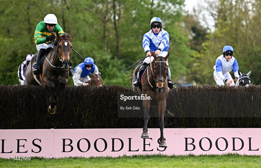 1 May 2026; Wonderwall, with Rob James up, right, jump the last alongside Its On The Line, with Derek O'Connor up, who finished second, on their way to winning the Uniquely Champion Hunters Chase on day four of the Punchestown Festival at Punchestown Racecourse in Kildare. Photo by Seb Daly/Sportsfile