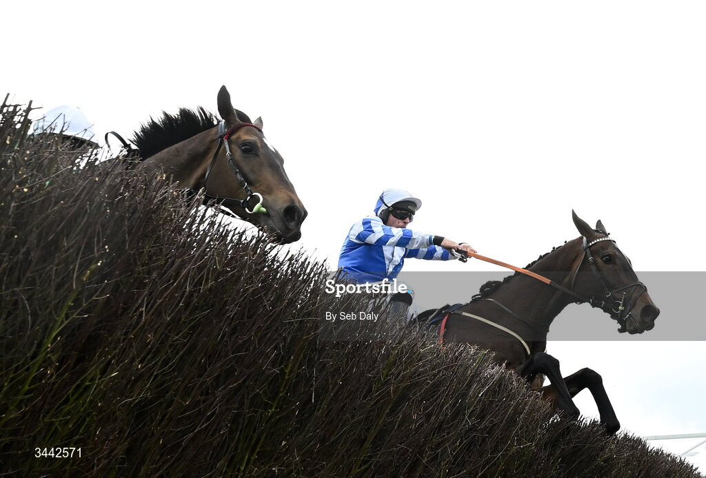 1 May 2026; Wonderwall, with Rob James up, right, jump the last alongside Its On The Line, with Derek O'Connor up, who finished second, on their way to winning the Uniquely Champion Hunters Chase on day four of the Punchestown Festival at Punchestown Racecourse in Kildare. Photo by Seb Daly/Sportsfile