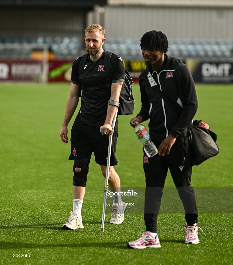 1 May 2026; Injured Dundalk goalkeeper Conor Kearns, left, and Gbemi Arubi of Dundalk before the SSE Airtricity Men's Premier Division match between Dundalk and Shelbourne at Oriel Park in Dundalk, Louth. Photo by Ben McShane/Sportsfile