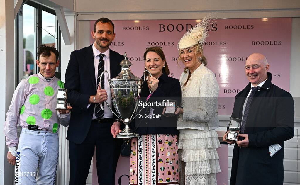 1 May 2026; Winning connections, including jockey Paul Townend and David Casey, representing trainer Willie Mullins, celebrate with the trophy after winning the Boodles Champion Hurdle with Lossiemouth on day four of the Punchestown Festival at Punchestown Racecourse in Kildare. Photo by Seb Daly/Sportsfile