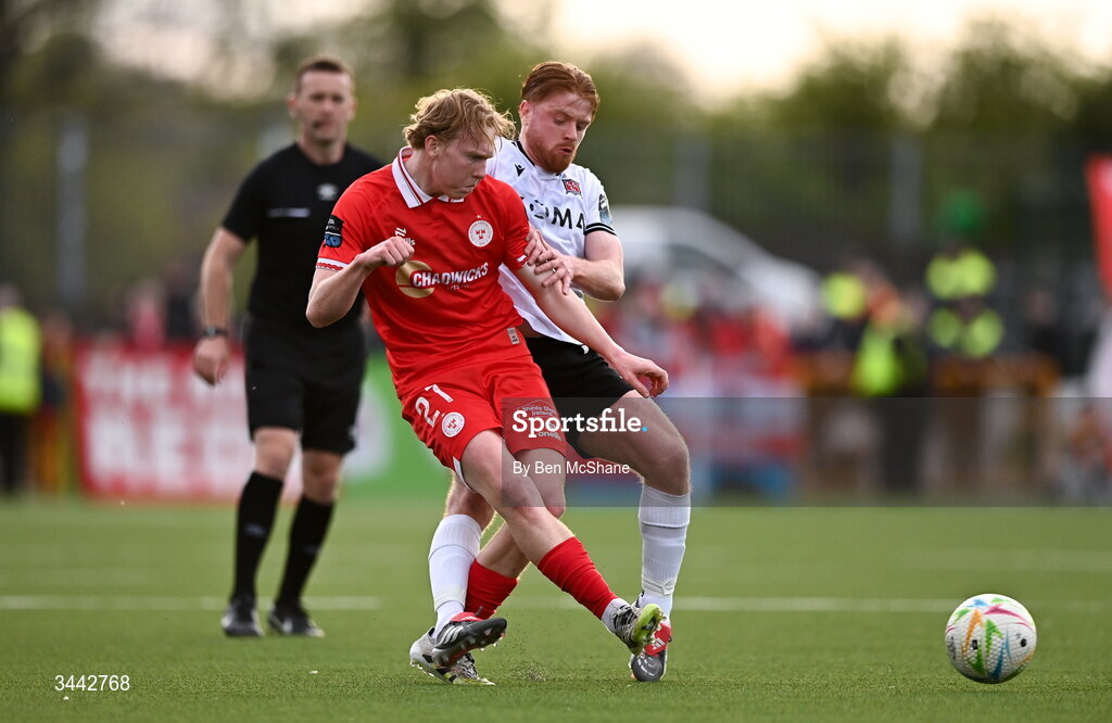1 May 2026; Jack Henry-Francis of Shelbourne is tackled by Aodh Dervin of Dundalk during the SSE Airtricity Men's Premier Division match between Dundalk and Shelbourne at Oriel Park in Dundalk, Louth. Photo by Ben McShane/Sportsfile