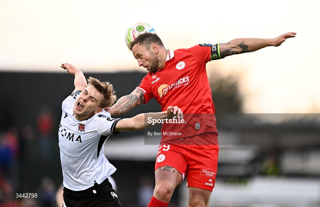 1 May 2026; Ronan Teahan of Dundalk is tackled by Paddy Barrett of Shelbourne during the SSE Airtricity Men's Premier Division match between Dundalk and Shelbourne at Oriel Park in Dundalk, Louth. Photo by Ben McShane/Sportsfile