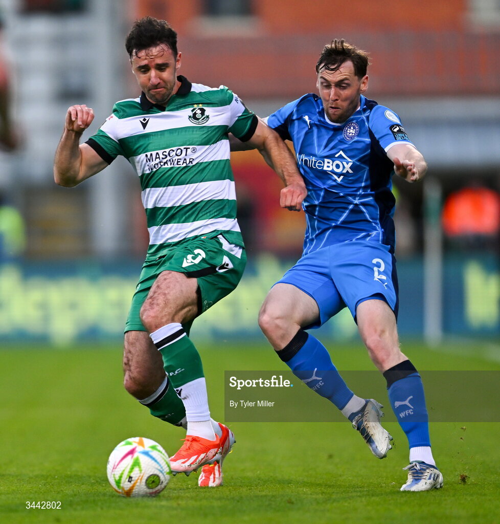 1 May 2026; Enda Stevens of Shamrock Rovers in action against Jordan Houston of Waterford during the SSE Airtricity Men's Premier Division match between Shamrock Rovers and Waterford at Tallaght Stadium in Dublin. Photo by Tyler Miller/Sportsfile