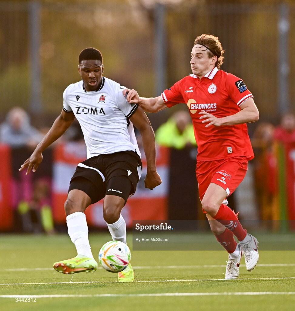 1 May 2026; Mayowa Animasahun of Dundalk in action against Harry Wood of Shelbourne during the SSE Airtricity Men's Premier Division match between Dundalk and Shelbourne at Oriel Park in Dundalk, Louth. Photo by Ben McShane/Sportsfile