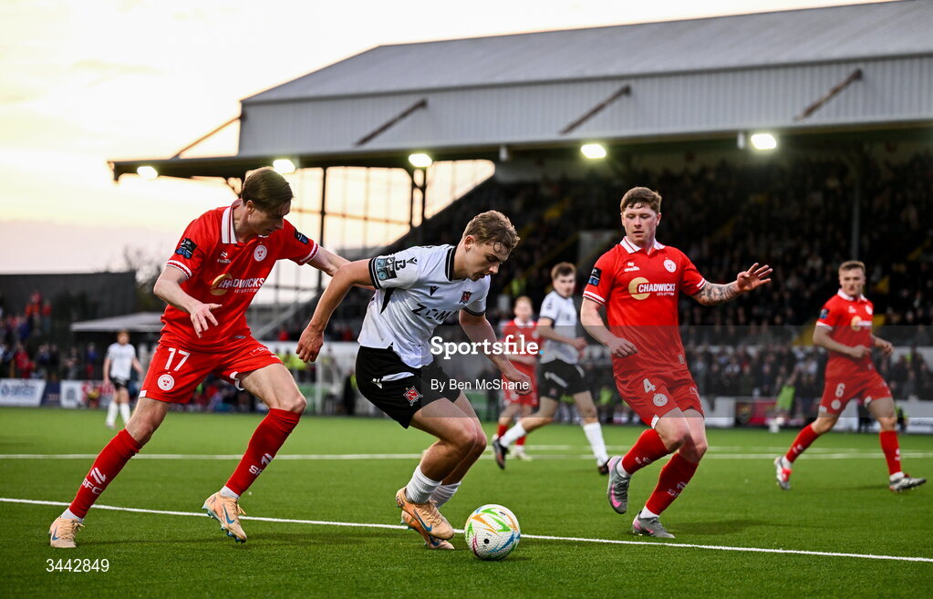 1 May 2026; Ronan Teahan of Dundalk in action against Daniel Kelly, left, and Kameron Ledwidge of Shelbourne during the SSE Airtricity Men's Premier Division match between Dundalk and Shelbourne at Oriel Park in Dundalk, Louth. Photo by Ben McShane/Sportsfile