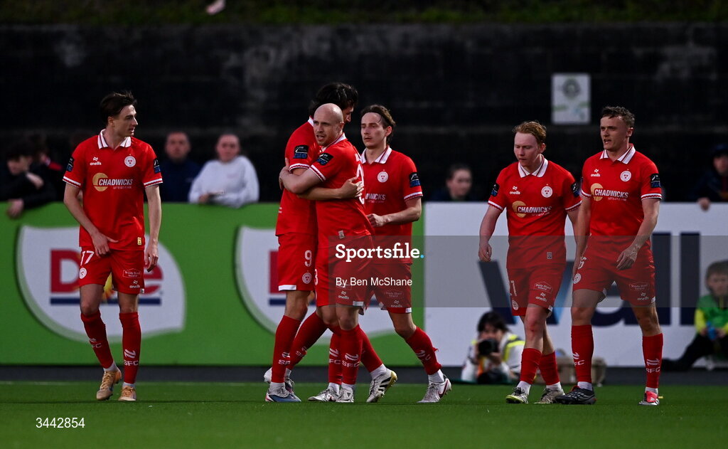 1 May 2026; Kerr McInroy of Shelbourne, centre, celebrates with teammates, including Sean Boyd, after scoring his side's second goal during the SSE Airtricity Men's Premier Division match between Dundalk and Shelbourne at Oriel Park in Dundalk, Louth. Photo by Ben McShane/Sportsfile