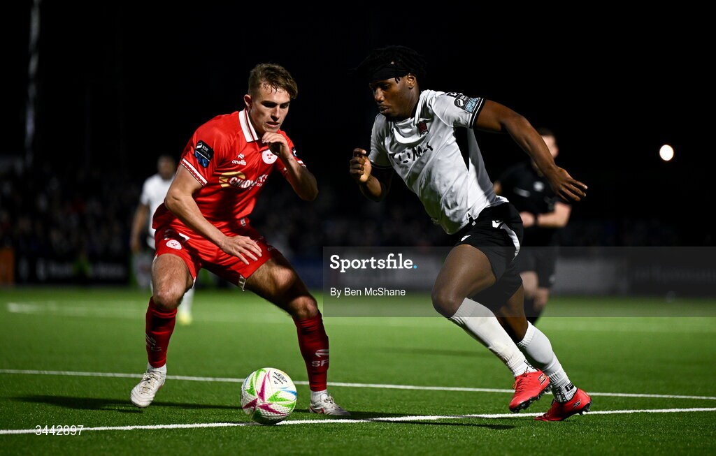 1 May 2026; Gbemi Arubi of Dundalk in action against Evan Caffrey of Shelbourne during the SSE Airtricity Men's Premier Division match between Dundalk and Shelbourne at Oriel Park in Dundalk, Louth. Photo by Ben McShane/Sportsfile