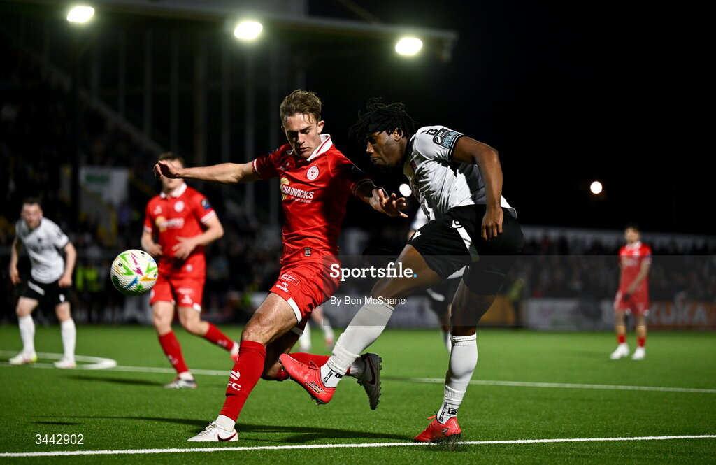 1 May 2026; Gbemi Arubi of Dundalk in action against Evan Caffrey of Shelbourne during the SSE Airtricity Men's Premier Division match between Dundalk and Shelbourne at Oriel Park in Dundalk, Louth. Photo by Ben McShane/Sportsfile