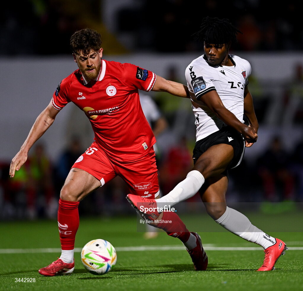 1 May 2026; Gbemi Arubi of Dundalk in action against Sam Bone of Shelbourne during the SSE Airtricity Men's Premier Division match between Dundalk and Shelbourne at Oriel Park in Dundalk, Louth. Photo by Ben McShane/Sportsfile