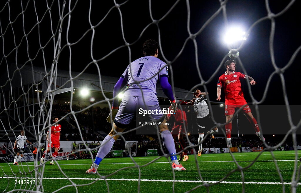 1 May 2026; Kameron Ledwidge of Shelbourne in action against Declan McDaid of Dundalk during the SSE Airtricity Men's Premier Division match between Dundalk and Shelbourne at Oriel Park in Dundalk, Louth. Photo by Ben McShane/Sportsfile
