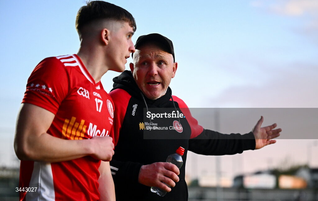 29 April 2026; Tyrone manager Paul Devlin, right, with Aidan Colton of Tyrone during the Dalata Hotel Group Ulster U20 Football Championship final match between Monaghan and Tyrone at BOX-IT Athletic Grounds in Armagh. Photo by Shauna Clinton/Sportsfile