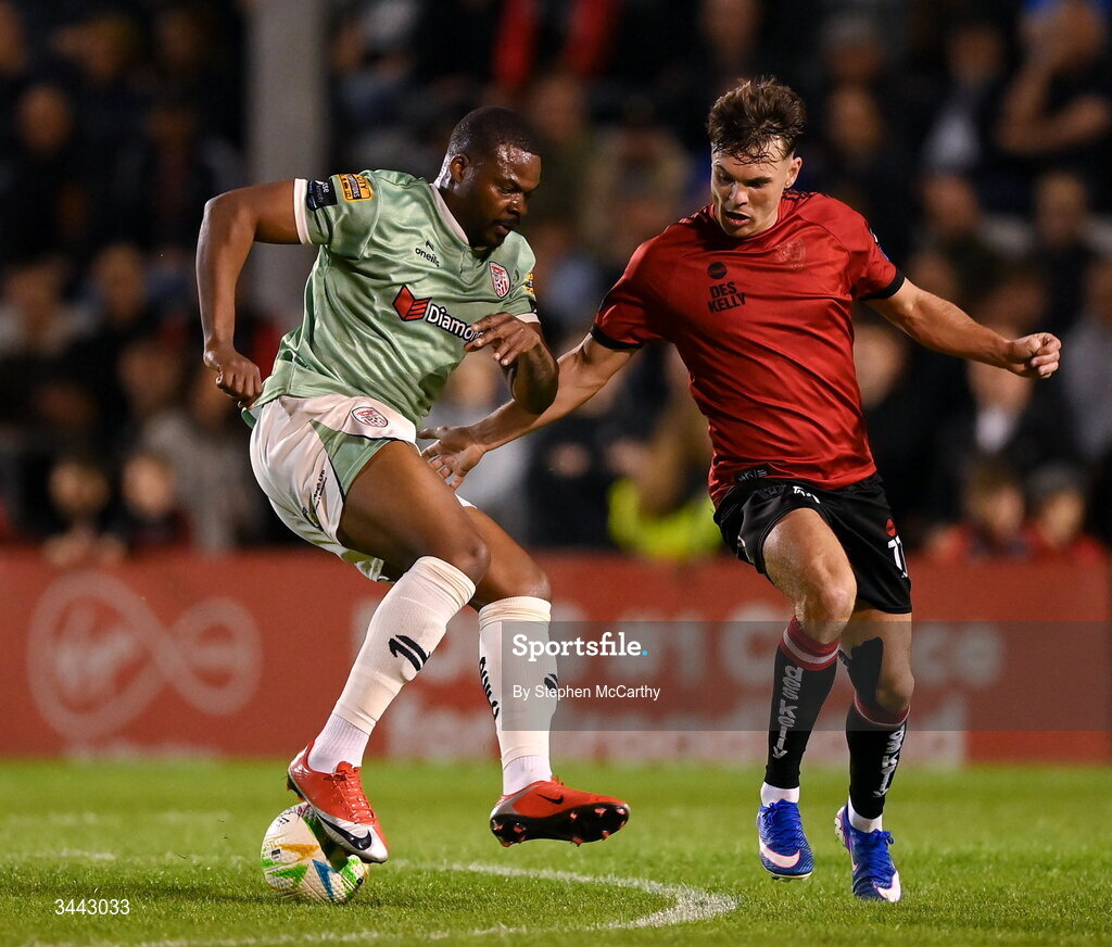 1 May 2026; Dipo Akinyemi of Derry City in action against Dayle Rooney of Bohemians during the SSE Airtricity Men's Premier Division match between Bohemians and Derry City at Dalymount Park in Dublin. Photo by Stephen McCarthy/Sportsfile