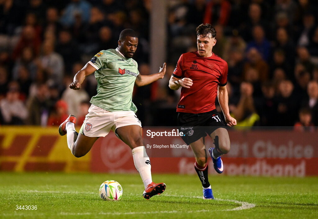 1 May 2026; Dipo Akinyemi of Derry City in action against Dayle Rooney of Bohemians during the SSE Airtricity Men's Premier Division match between Bohemians and Derry City at Dalymount Park in Dublin. Photo by Stephen McCarthy/Sportsfile