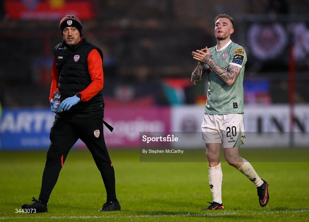 1 May 2026; Carl Winchester of Derry City leaves the pitch with physiotherapist Colum O'Neill during the SSE Airtricity Men's Premier Division match between Bohemians and Derry City at Dalymount Park in Dublin. Photo by Stephen McCarthy/Sportsfile