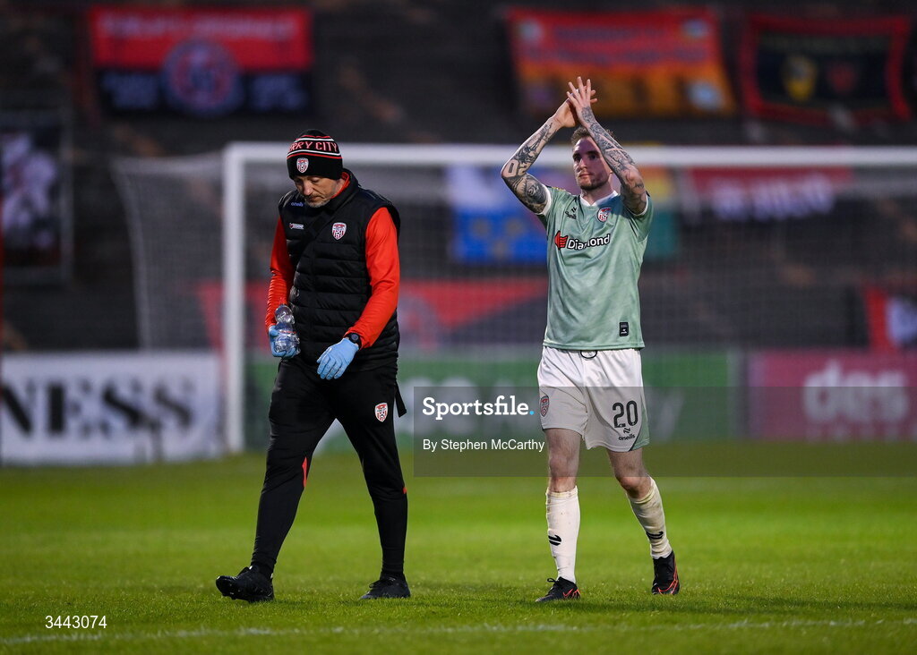 1 May 2026; Carl Winchester of Derry City leaves the pitch with physiotherapist Colum O'Neill during the SSE Airtricity Men's Premier Division match between Bohemians and Derry City at Dalymount Park in Dublin. Photo by Stephen McCarthy/Sportsfile