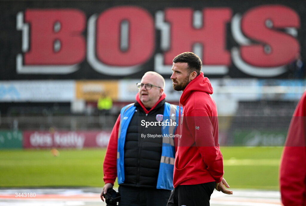 1 May 2026; Patrick McClean of Derry City with team photographer Kevin Morrison before the SSE Airtricity Men's Premier Division match between Bohemians and Derry City at Dalymount Park in Dublin. Photo by Stephen McCarthy/Sportsfile
