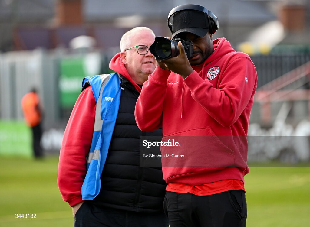 1 May 2026; Dipo Akinyemi of Derry City with team photographer Kevin Morrison before the SSE Airtricity Men's Premier Division match between Bohemians and Derry City at Dalymount Park in Dublin. Photo by Stephen McCarthy/Sportsfile
