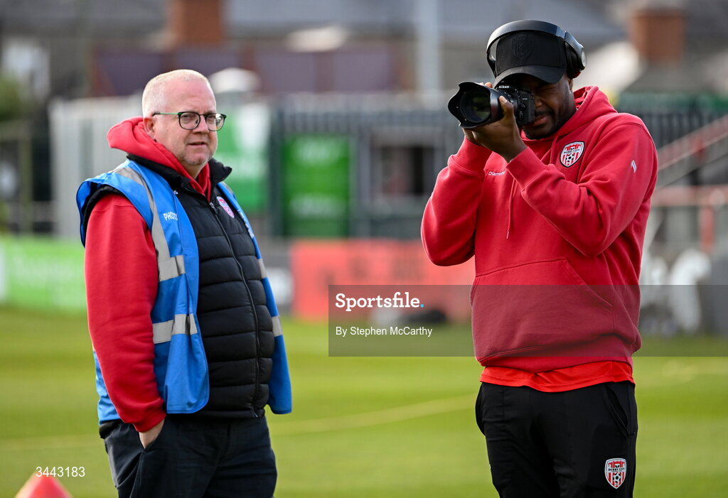 1 May 2026; Dipo Akinyemi of Derry City with team photographer Kevin Morrison before the SSE Airtricity Men's Premier Division match between Bohemians and Derry City at Dalymount Park in Dublin. Photo by Stephen McCarthy/Sportsfile