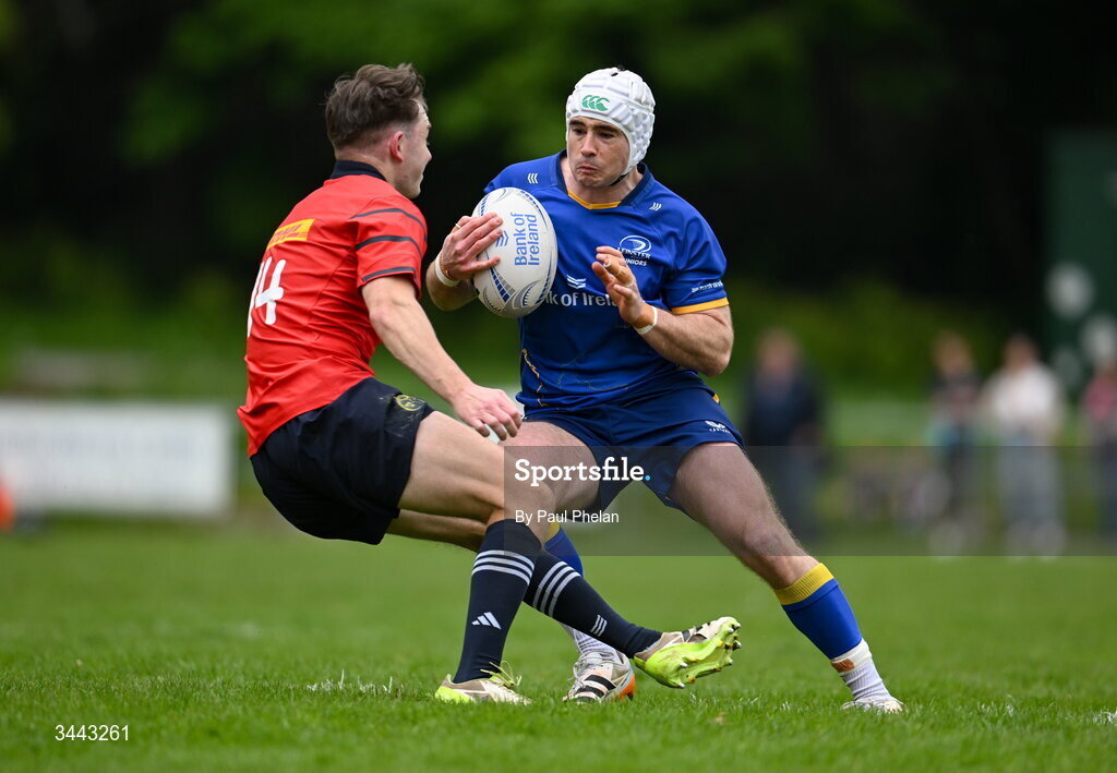 2 May 2026; Cormac Hurley of Leinster is tackled by Matthew Crowley of Munster during the IRFU Men's Junior Interprovincials Round 2 match between Munster and Leinster at DLSP FC in Kiltiernan, Dublin. Photo by Paul Phelan/Sportsfile