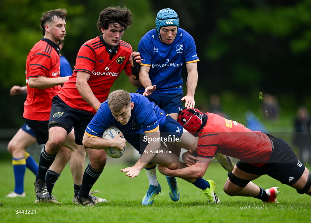 2 May 2026; Matt McKenna of Leinster is tackled by Sam Quinlan of Munster during the IRFU Men's Junior Interprovincials Round 2 match between Munster and Leinster at DLSP FC in Kiltiernan, Dublin. Photo by Paul Phelan/Sportsfile