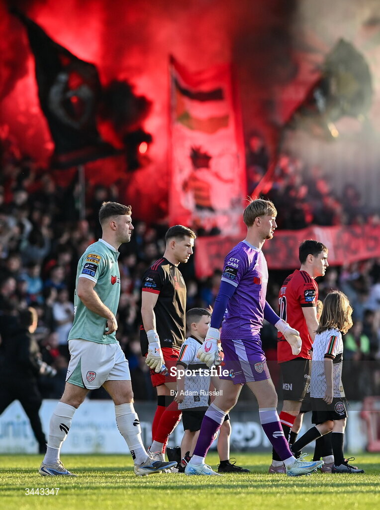 1 May 2026; Derry City goalkeeper Eddie Beach and Jamie Stott, left, walk out for the SSE Airtricity Men's Premier Division match between Bohemians and Derry City at Dalymount Park in Dublin. Photo by Adam Russell/Sportsfile
