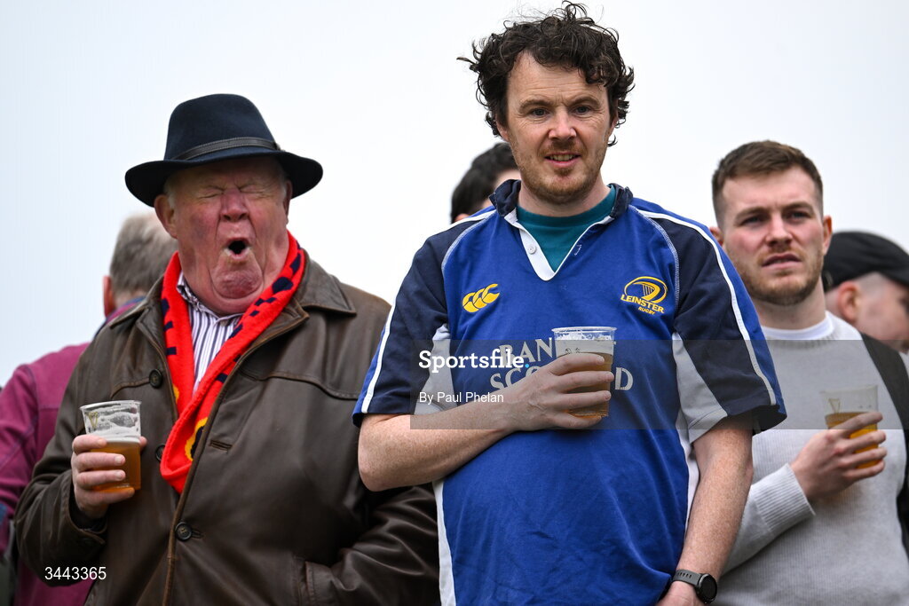 2 May 2026; A Munster supporter and a Leinster supporter react during the IRFU Men's Junior Interprovincials Round 2 match between Munster and Leinster at DLSP FC in Kiltiernan, Dublin. Photo by Paul Phelan/Sportsfile