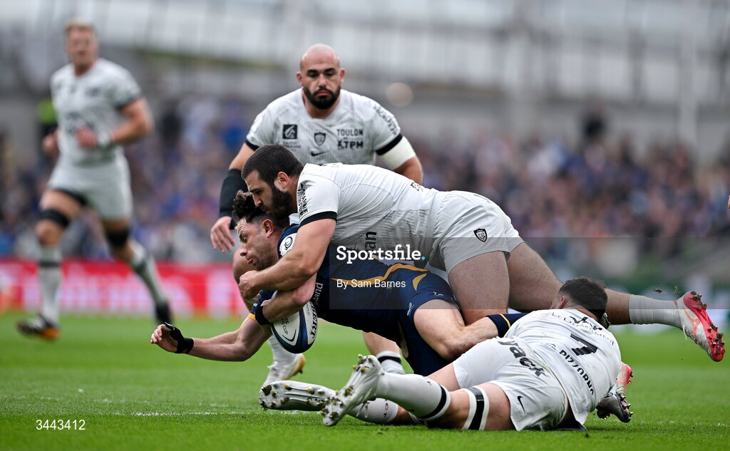 2 May 2026; Hugo Keenan of Leinster is tackled by Mikheil Shioshvili, top, and Charles Ollivon during the Investec Champions Cup semi-final match between Leinster and RC Toulon at the Aviva Stadium in Dublin. Photo by Sam Barnes/Sportsfile