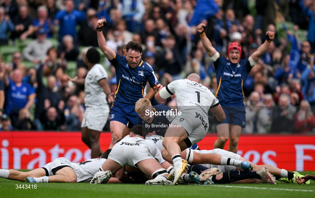 2 May 2026; Tommy O'Brien, centre, and Hugo Keenan of Leinster, left, of Leinster celebrate after teammate Jack Conan, not pictured, scores their first try during the Investec Champions Cup semi-final match between Leinster and RC Toulon at the Aviva Stadium in Dublin. Photo by Brendan Moran/Sportsfile