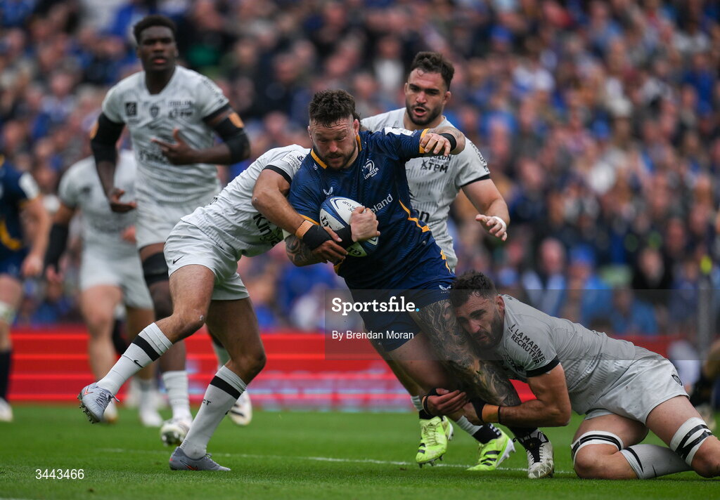 2 May 2026; Andrew Porter of Leinster is tackled by Melvyn Jaminet, left, and Charles Ollivon of RC Toulon during the Investec Champions Cup semi-final match between Leinster and RC Toulon at the Aviva Stadium in Dublin. Photo by Brendan Moran/Sportsfile