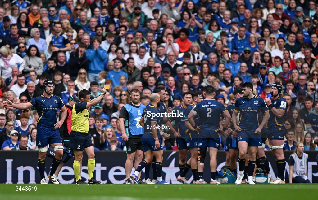 2 May 2026; Referee Luke Pearce shows a yellow card to Leinster's Harry Byrne, second from right, during the Investec Champions Cup semi-final match between Leinster and RC Toulon at the Aviva Stadium in Dublin. Photo by Seb Daly/Sportsfile