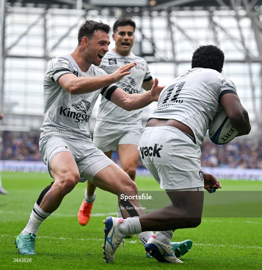 2 May 2026; Setariki Tuicuvu of RC Toulon, 11, celebrates with teammates Ben White, left, and Tomas Albornoz after scoring their side's first try during the Investec Champions Cup semi-final match between Leinster and RC Toulon at the Aviva Stadium in Dublin. Photo by Sam Barnes/Sportsfile