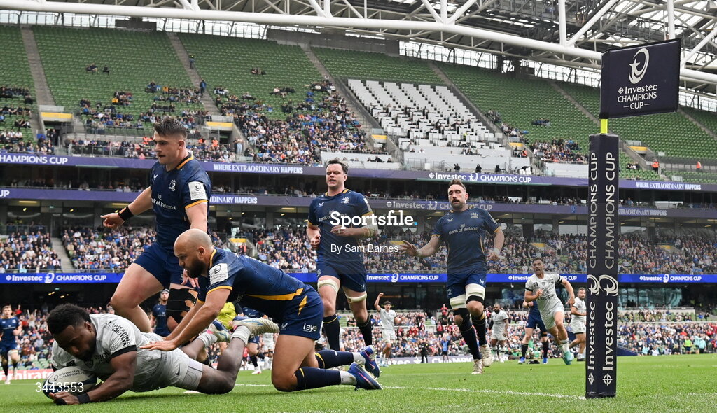 2 May 2026; Setariki Tuicuvu of RC Toulon dives over to score his side's first try despite the efforts of Jamison Gibson-Park, right, and Dan Sheehan of Leinster during the Investec Champions Cup semi-final match between Leinster and RC Toulon at the Aviva Stadium in Dublin. Photo by Sam Barnes/Sportsfile