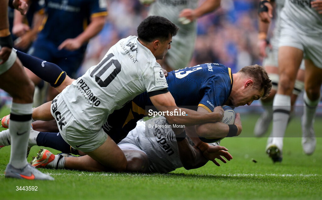 2 May 2026; Garry Ringrose of Leinster dives over to score his side's third try despite the efforts of Tomas Albornoz of RC Toulon, 10, during the Investec Champions Cup semi-final match between Leinster and RC Toulon at the Aviva Stadium in Dublin. Photo by Brendan Moran/Sportsfile